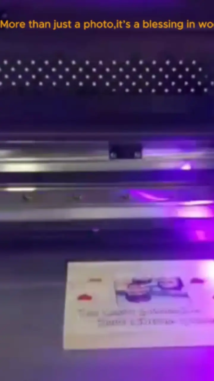Photo being UV-printed onto a wooden board